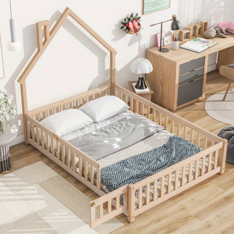 Natural Floor Bed with a Headboard Shaped Like a Full House And a Fence.