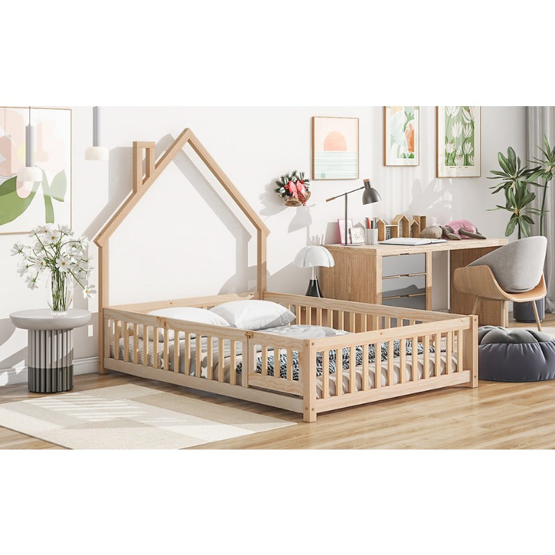 Natural Floor Bed with a Headboard Shaped Like a Full House And a Fence.